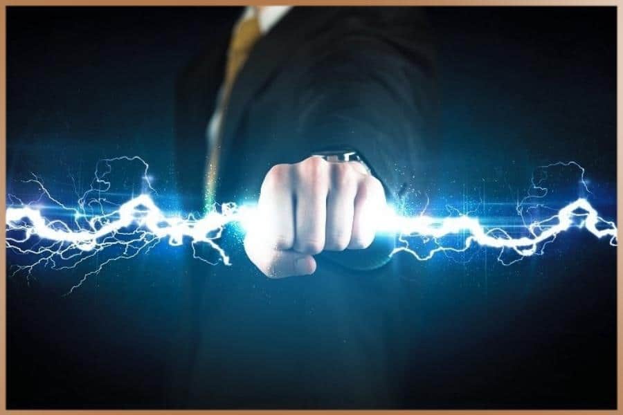 Hand holding electric energy during electrokinesis practice