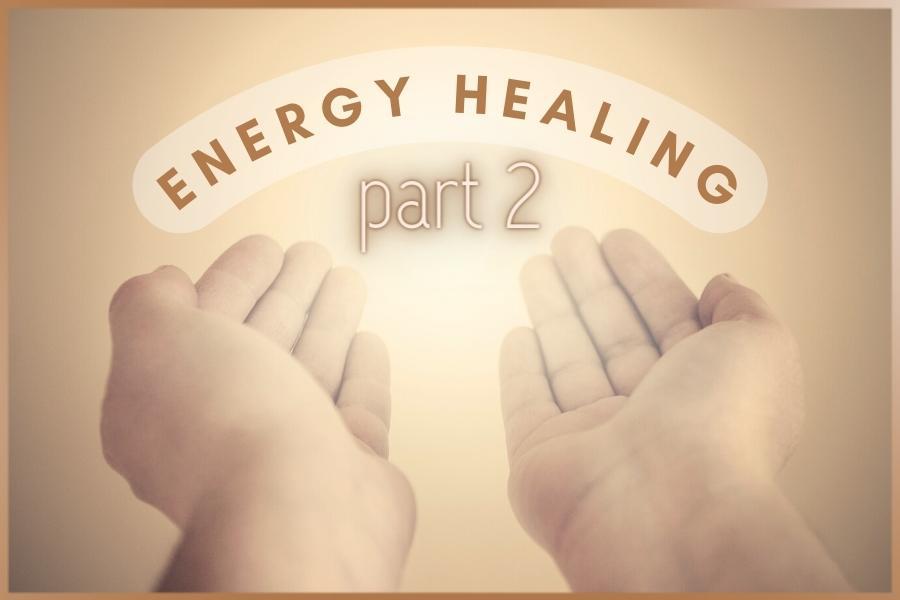 Hands of the spiritual or energy healer and bright white energy around them